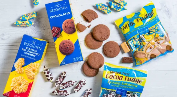Popularne słodycze bez glutenu: czekoladowe ciastka, kruche ciasteczka i krówki mleczne oraz kakaowe. Idealne dla każdego!